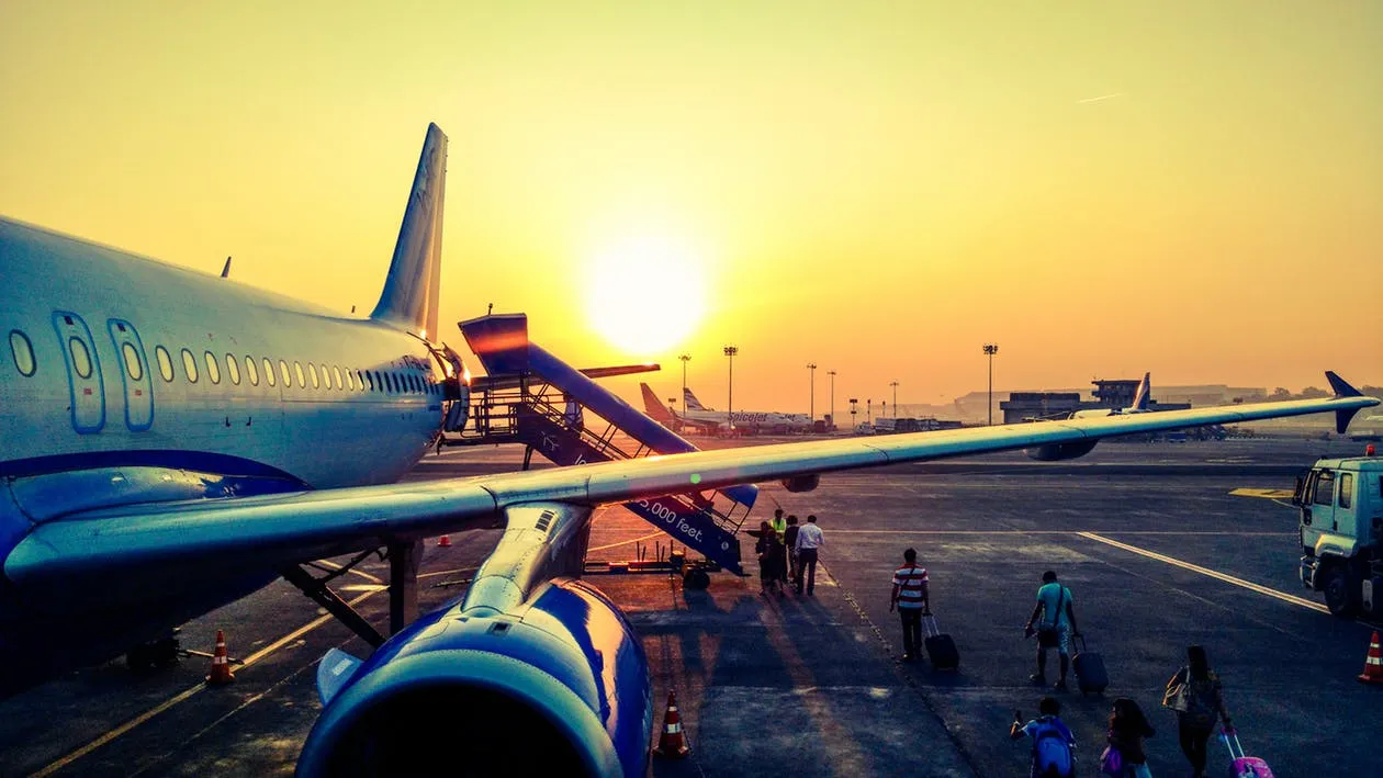 Plane wing at sunset