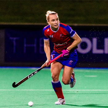 Jane Claxton playing hockey