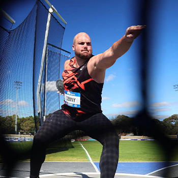 Matthew Denny throwing the discus